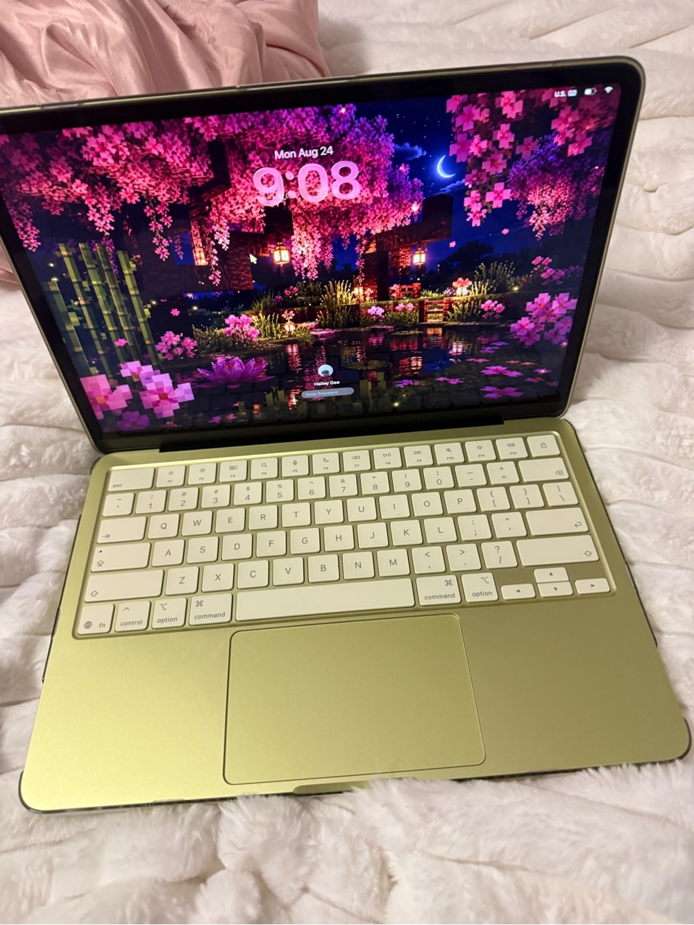 Apple Green MacBook with White Keyboard